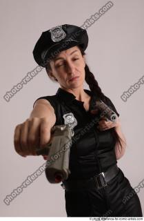 29 NIKITA POLICEWOMAN STANDING POSE WITH TWO GUNS